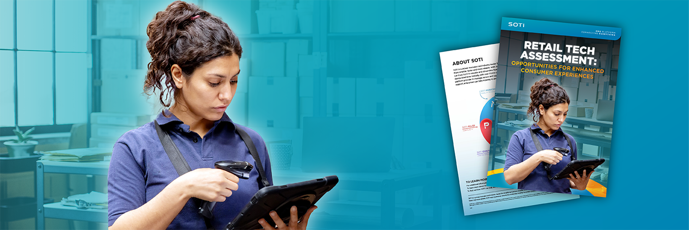 Warehouse worker using a handheld scanner and tablet, with SOTI’s 2026 Retail Report, Retail Tech Assessment: Opportunities for Enhanced Consumer Experiences documents displayed in the background.